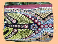 Um dos impressionantes didgeridus pintados por Brad Gosam
